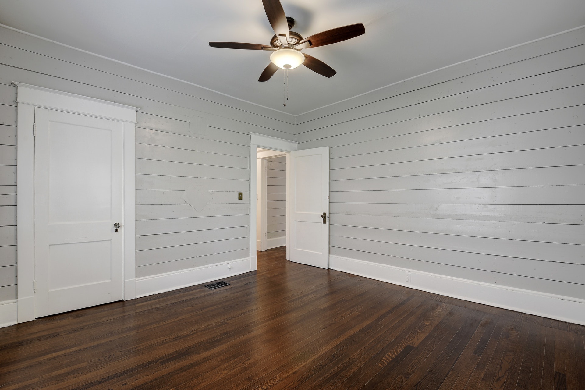 903 Shoal Cliff Court Austin, TX 78705 - Photo 12 of 32 wooden floor in an empty room