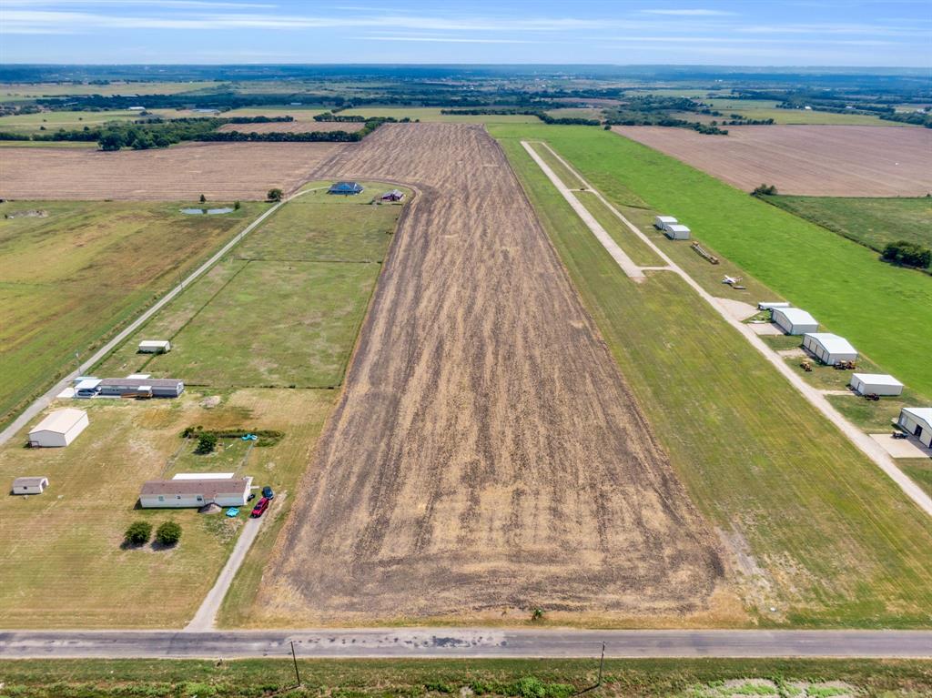 345 North Armstrong Road Venus, TX 76084 - Photo 12 of 18 a view of swimming pool with a yard
