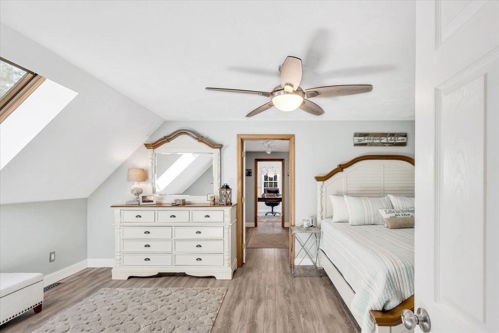 17 Wellfield Road Sandwich, MA 02644 - Photo 19 of 39 a bedroom with a bed and a dresser