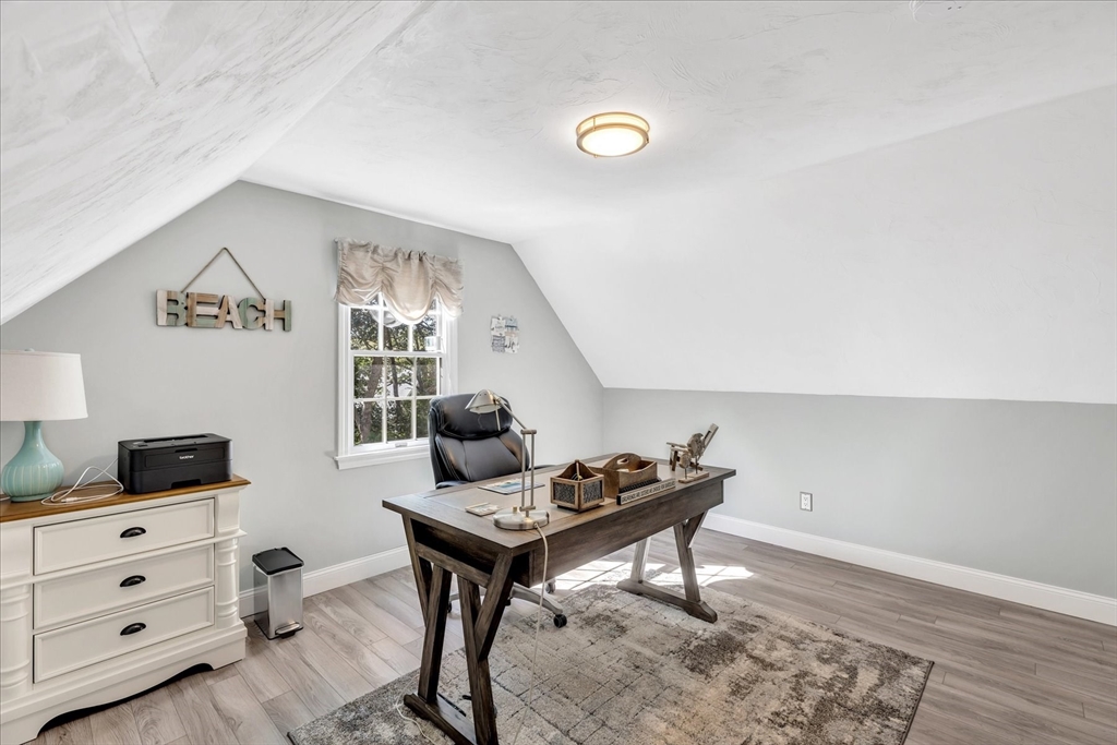 17 Wellfield Road Sandwich, MA 02644 - Photo 22 of 39 a room with furniture and wooden floor