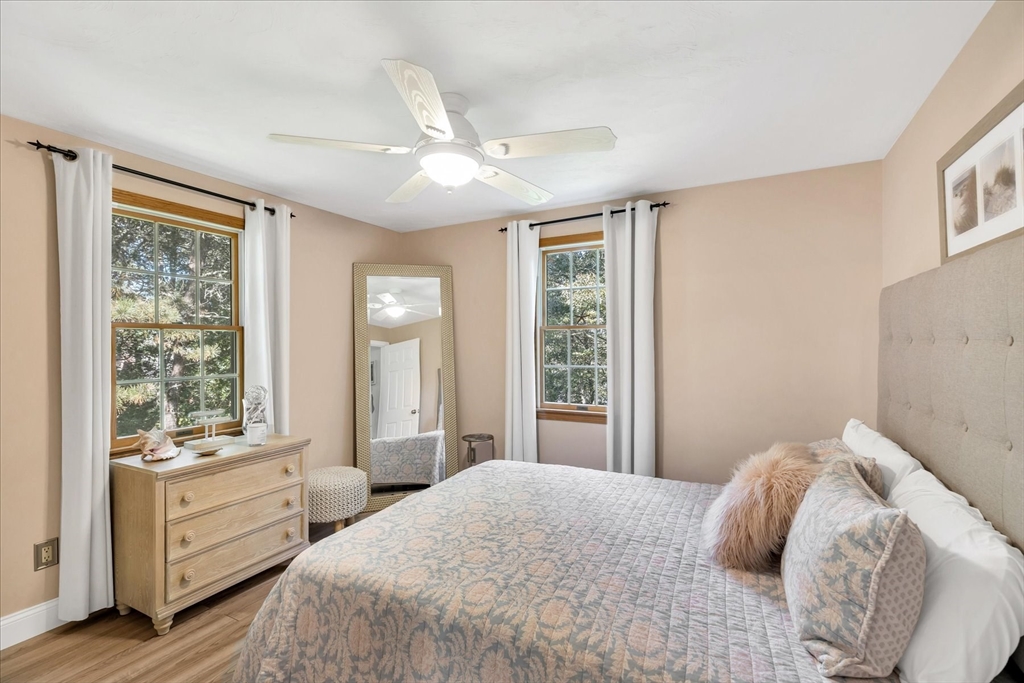 17 Wellfield Road Sandwich, MA 02644 - Photo 25 of 39 a bedroom with a large bed and a large window