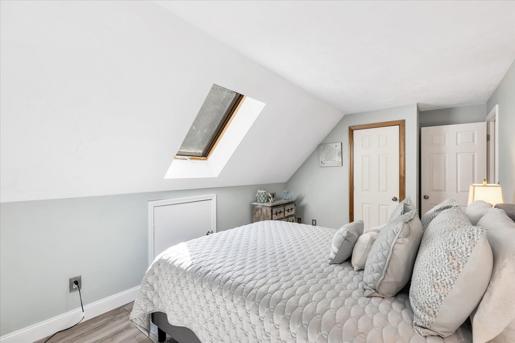 17 Wellfield Road Sandwich, MA 02644 - Photo 30 of 39 a bedroom with a bed and a window