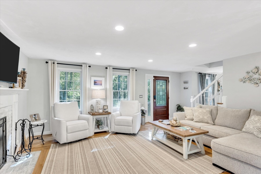 17 Wellfield Road Sandwich, MA 02644 - Photo 3 of 39 a living room with furniture and a flat screen tv