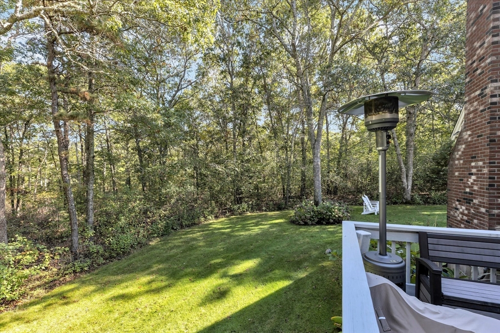 17 Wellfield Road Sandwich, MA 02644 - Photo 33 of 39 a view of a porch with a yard