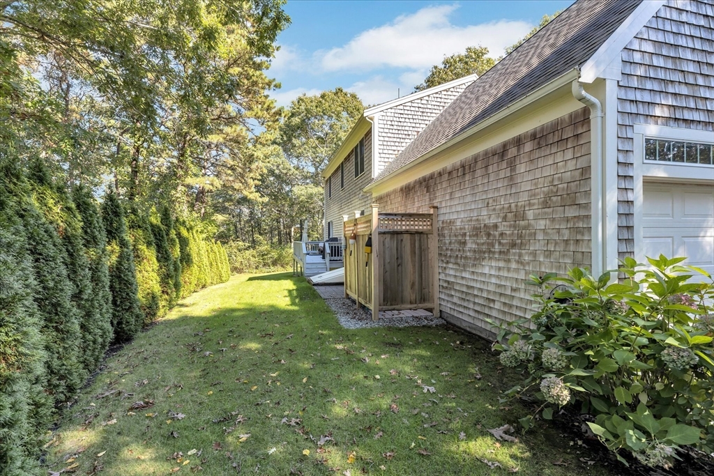 17 Wellfield Road Sandwich, MA 02644 - Photo 34 of 39 a view of backyard with garden