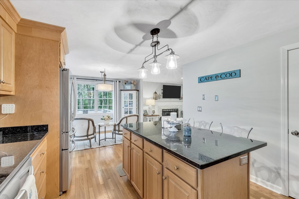 17 Wellfield Road Sandwich, MA 02644 - Photo 7 of 39 a kitchen with sink cabinets and wooden floor