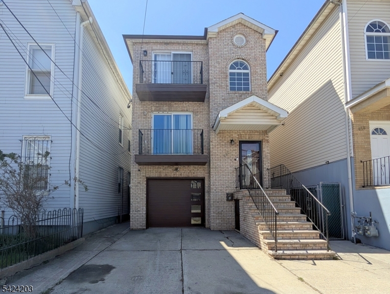 448 Fulton Street Elizabeth Port, NJ 07206 - Photo 2 of 37 a view of entryway with a front door