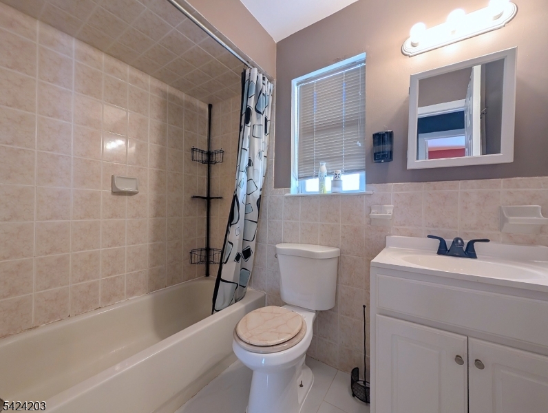 448 Fulton Street Elizabeth Port, NJ 07206 - Photo 28 of 37 a bathroom with a sink toilet and shower