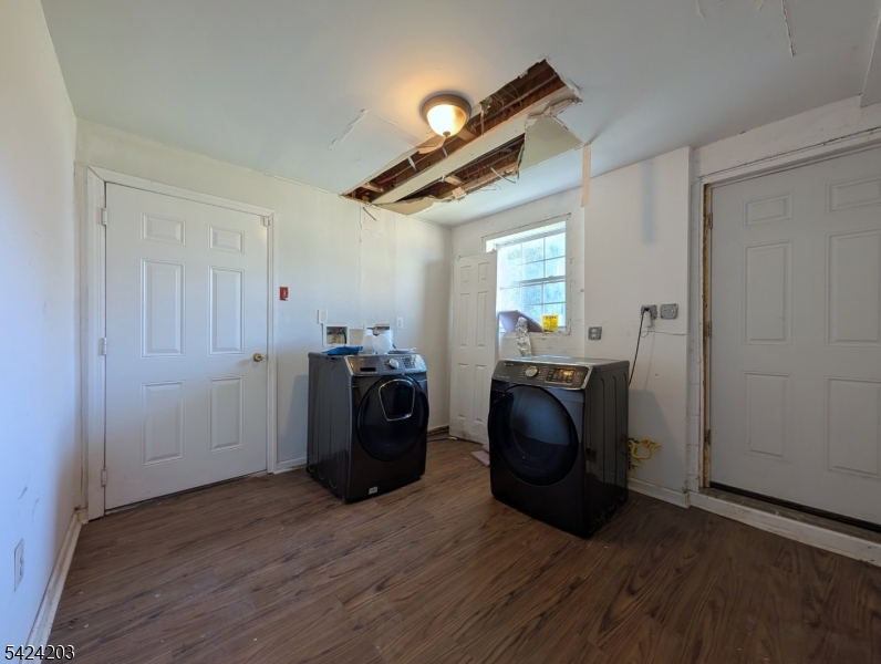 448 Fulton Street Elizabeth Port, NJ 07206 - Photo 33 of 37 a view of a livingroom with furniture and wooden floor