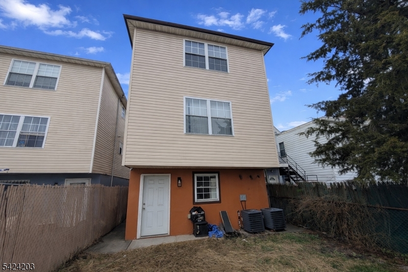 448 Fulton Street Elizabeth Port, NJ 07206 - Photo 36 of 37 a front view of a house with garden