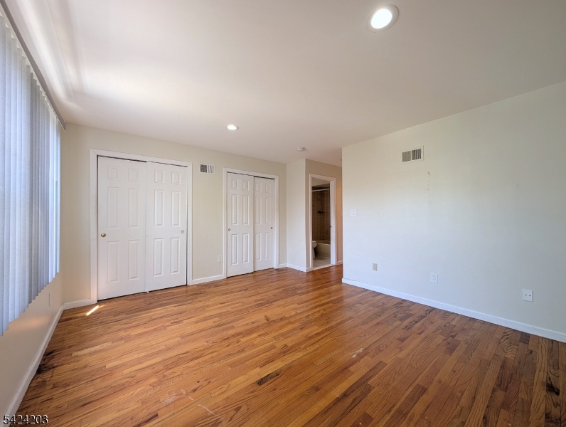 448 Fulton Street Elizabeth Port, NJ 07206 - Photo 10 of 37 a view of an empty room with wooden floor