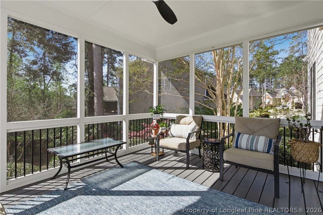 14 Spring Water Court Spring Lake, NC 28390 - Photo 23 of 34 a living room with furniture and a floor to ceiling window
