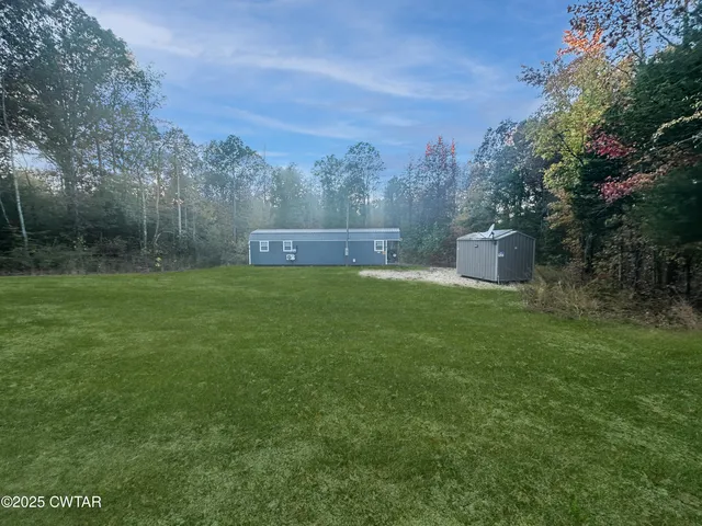 a view of a outdoor space and a yard