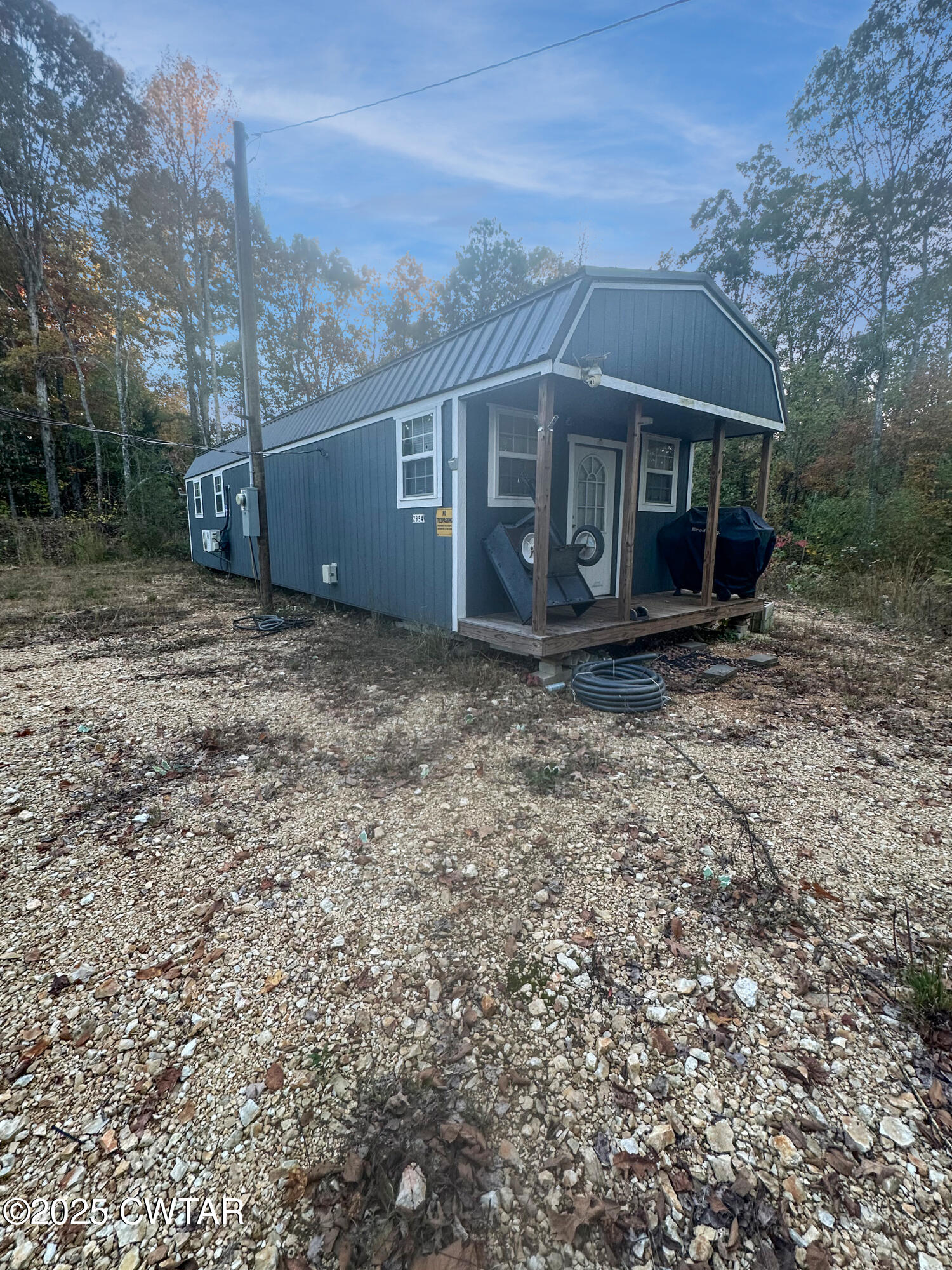 2954 Mt Carmel Road Camden, TN 38320 - Photo 3 of 18 a view of a house with a yard