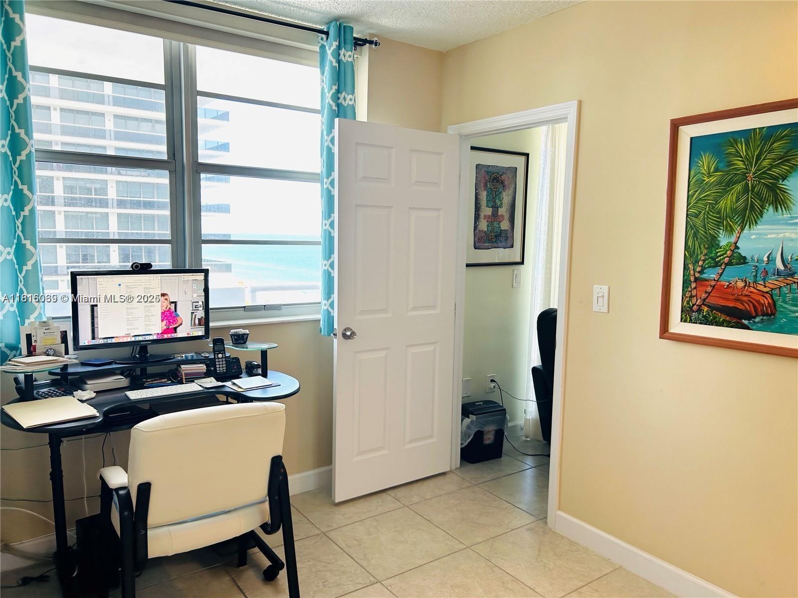 Corinthian Condominiums Miami Beach, FL 33140 - Photo 15 of 19 a room with furniture and a window