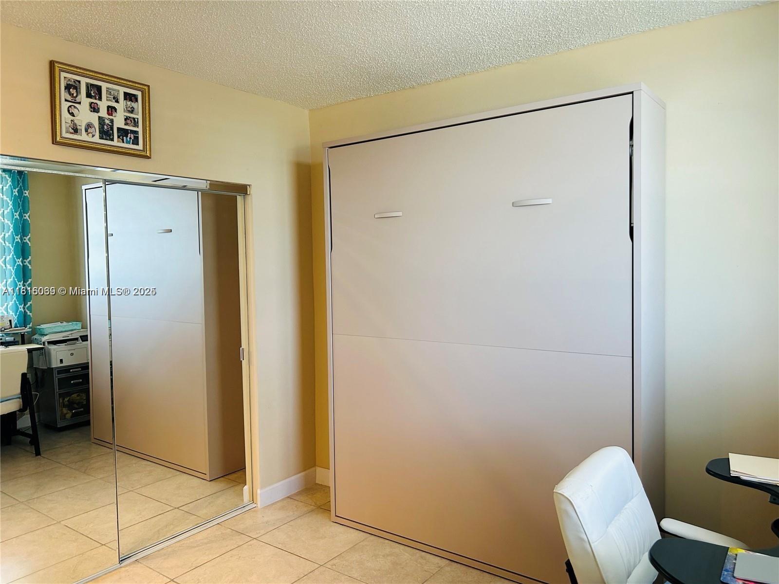 Corinthian Condominiums Miami Beach, FL 33140 - Photo 16 of 19 a view of a hallway with elevator