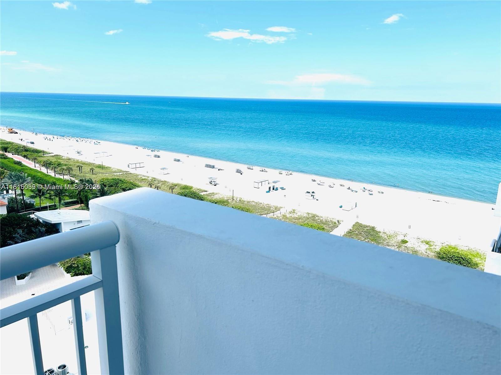 Corinthian Condominiums Miami Beach, FL 33140 - Photo 2 of 19 a view of an ocean from a balcony