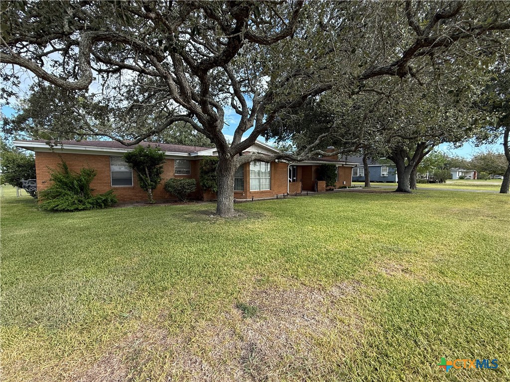 2834 Highway 238 Port Lavaca, TX 77979 - Photo 2 of 45 a front view of house with yard and green space