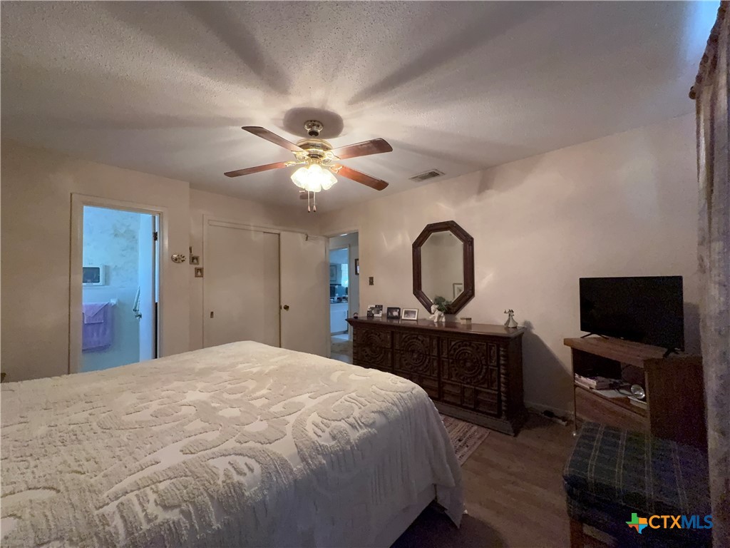 2834 Highway 238 Port Lavaca, TX 77979 - Photo 27 of 45 a bedroom with a bed and a flat screen tv