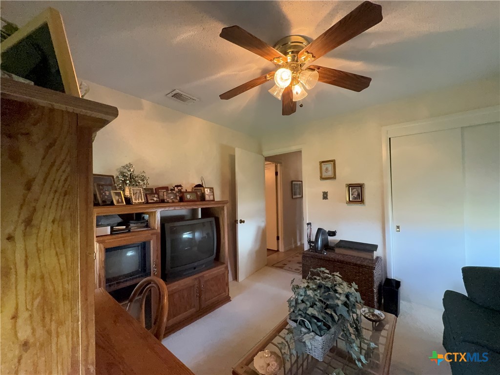 2834 Highway 238 Port Lavaca, TX 77979 - Photo 34 of 45 a living room with furniture and a flat screen tv