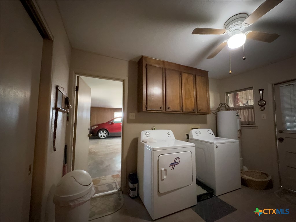 2834 Highway 238 Port Lavaca, TX 77979 - Photo 35 of 45 a view of a storage and utility room with washer and dryer