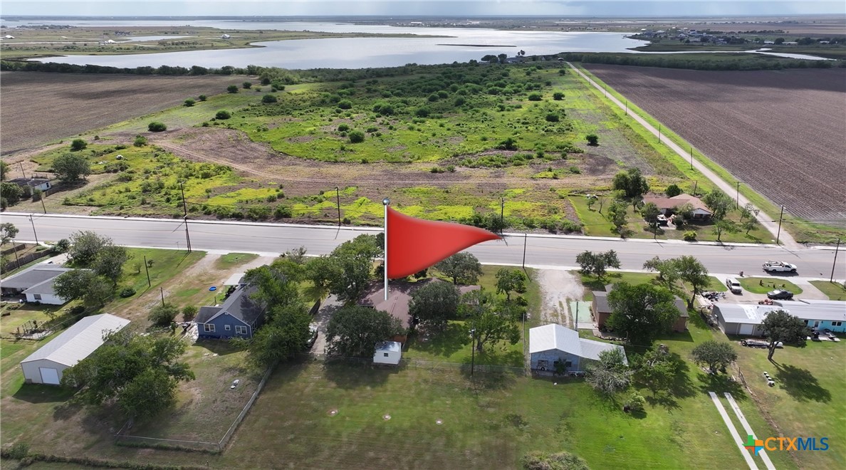 2834 Highway 238 Port Lavaca, TX 77979 - Photo 44 of 45 an aerial view of a house with a yard and lake view