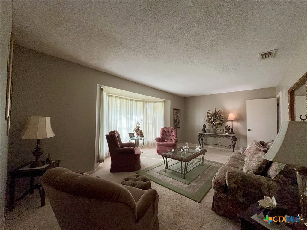 2834 Highway 238 Port Lavaca, TX 77979 - Photo 10 of 45 a living room with furniture and a window