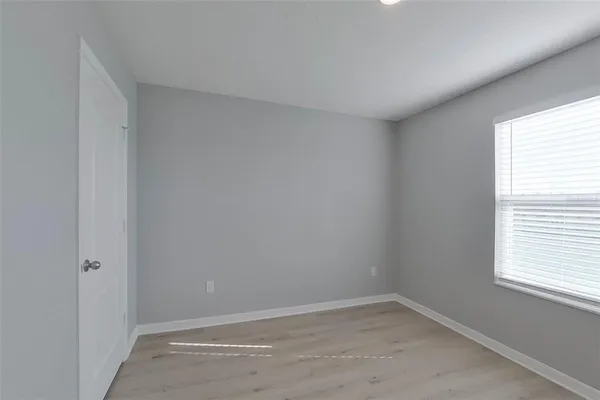 an empty room with a window