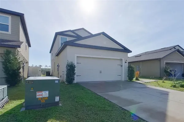 a view of outdoor space yard and garage