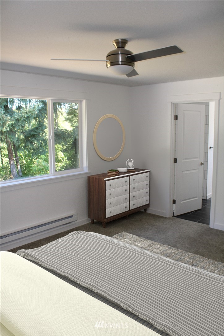 103 Eadon Road Toledo, WA 98591 - Photo 12 of 26 a living room with a bed furniture and a window