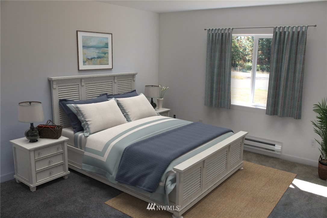 103 Eadon Road Toledo, WA 98591 - Photo 17 of 26 a bedroom with bed and window