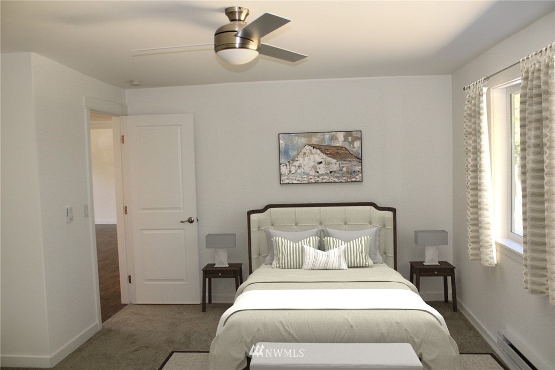 103 Eadon Road Toledo, WA 98591 - Photo 18 of 26 a bedroom with a bed and a window