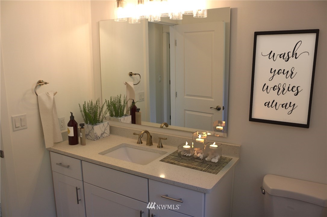 103 Eadon Road Toledo, WA 98591 - Photo 19 of 26 a bathroom with a sink and a mirror