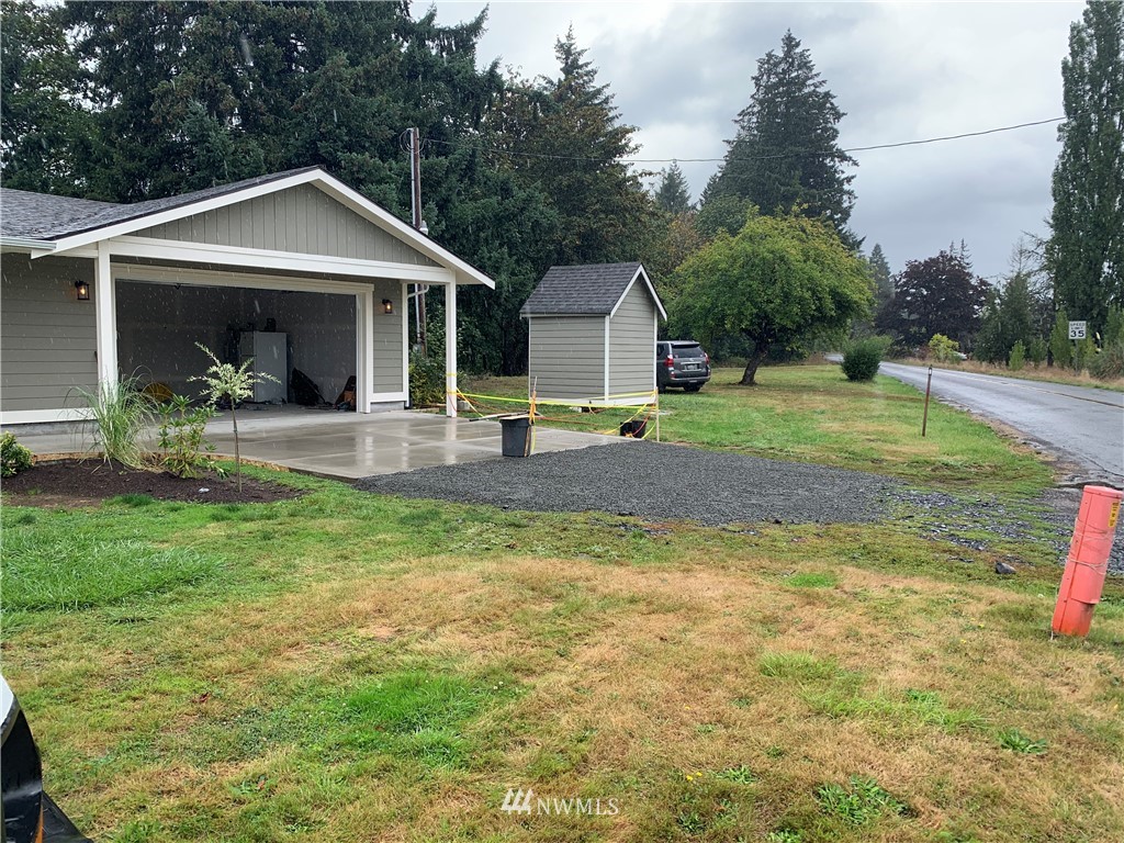 103 Eadon Road Toledo, WA 98591 - Photo 22 of 26 a view of a house with backyard and sitting area