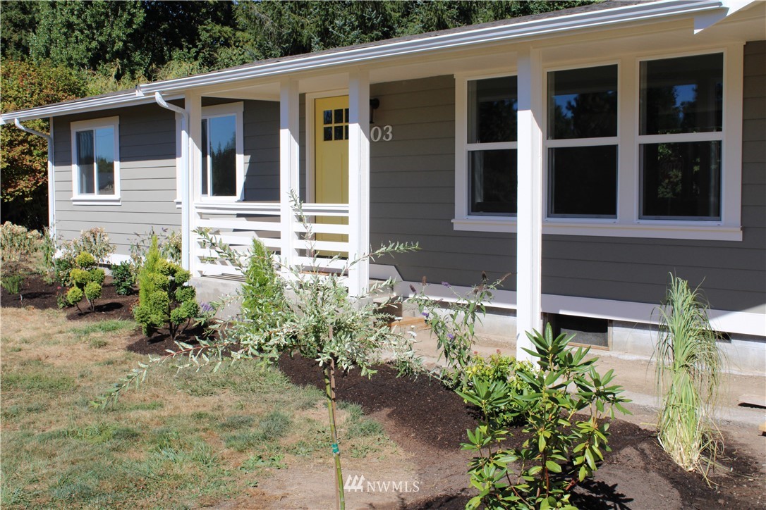 103 Eadon Road Toledo, WA 98591 - Photo 5 of 26 a front view of a house with a yard