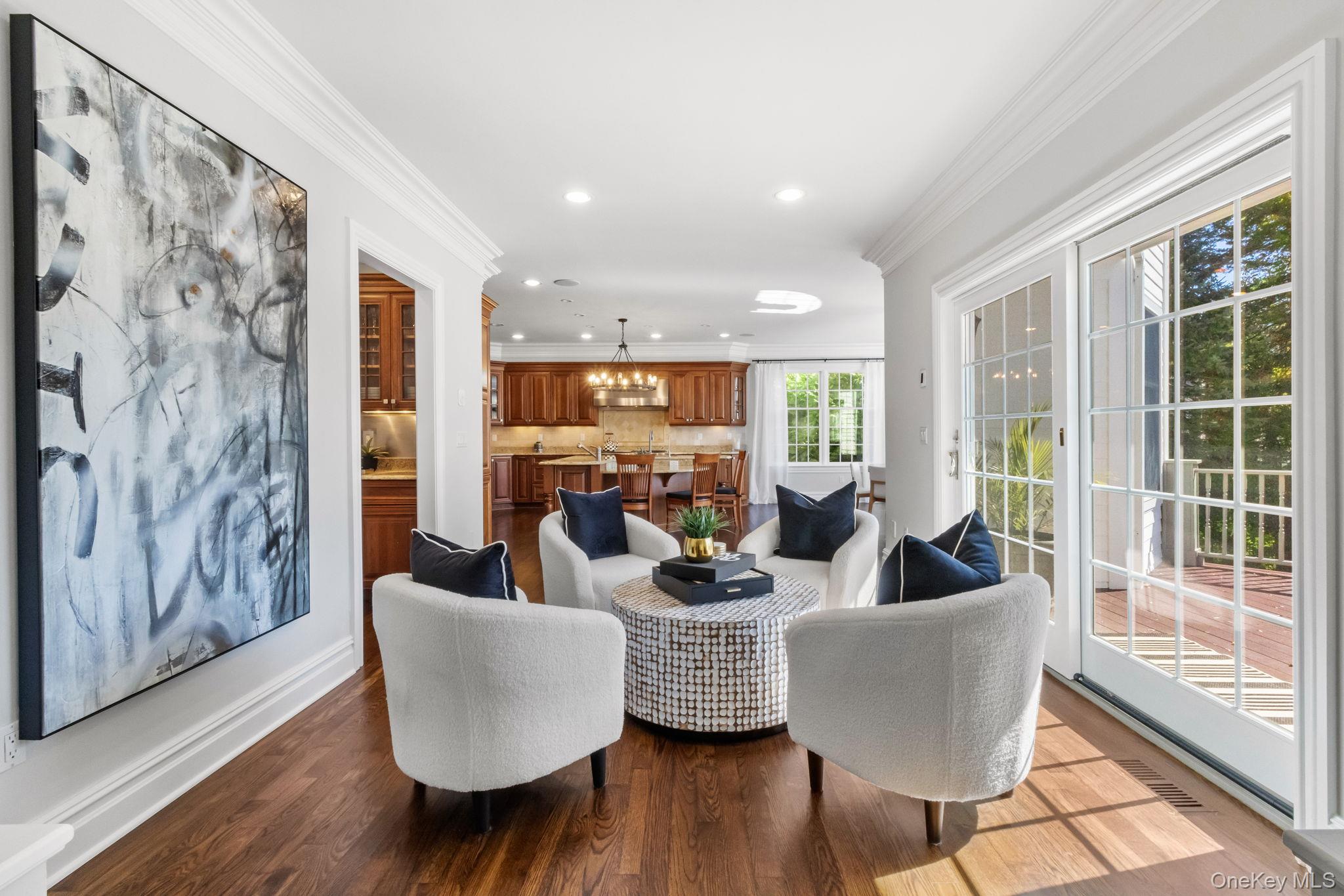 496 Long Ridge Road Bedford, NY 10576 - Photo 12 of 49 a living room with couches a coffee table and next to a window