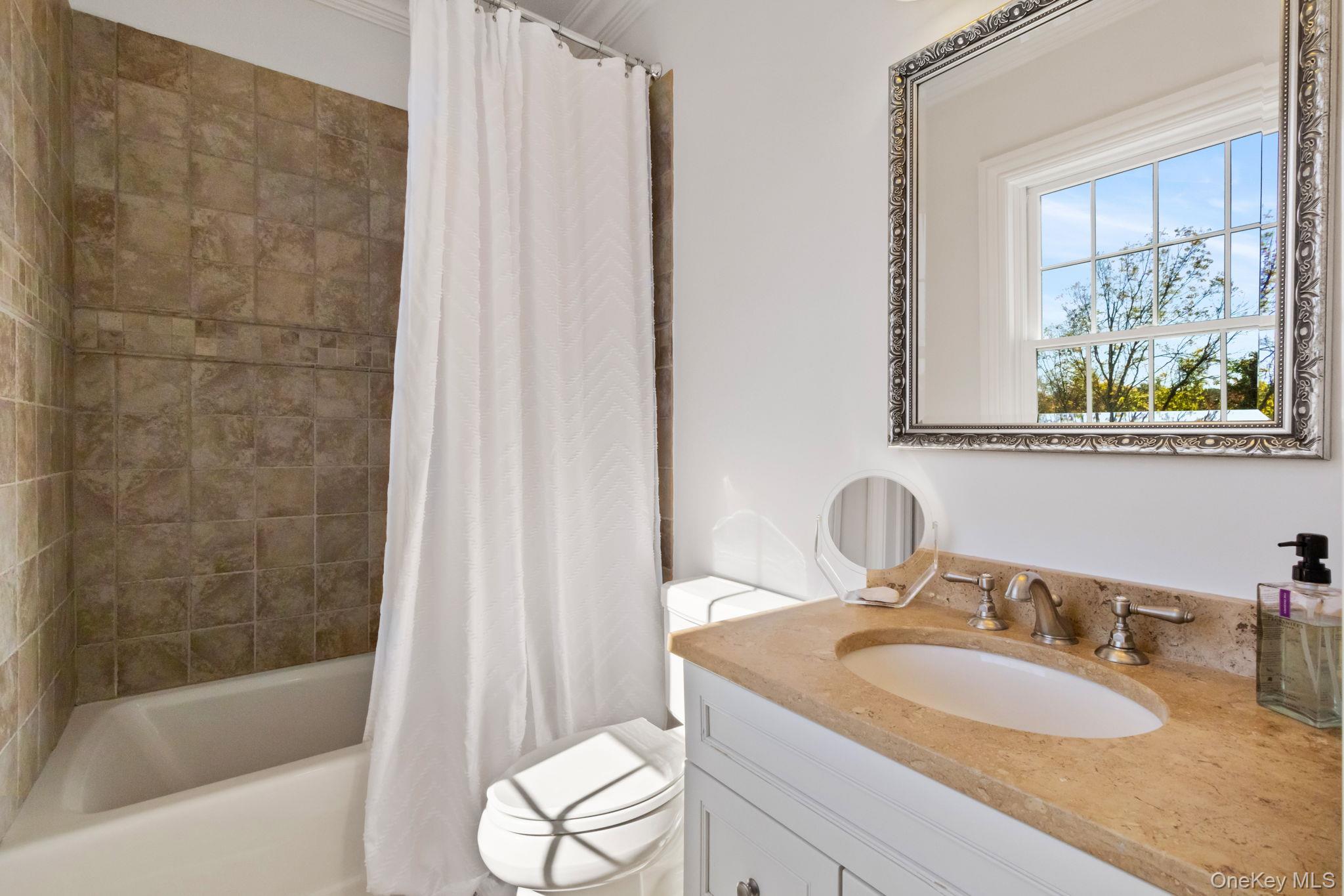 496 Long Ridge Road Bedford, NY 10576 - Photo 29 of 49 a bathroom with a granite countertop sink and a mirror