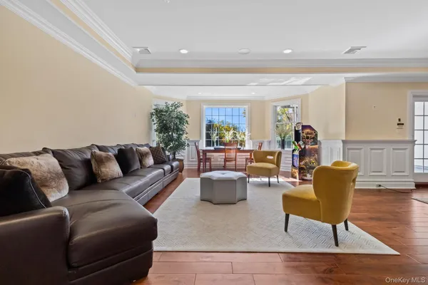 a living room with furniture and a table