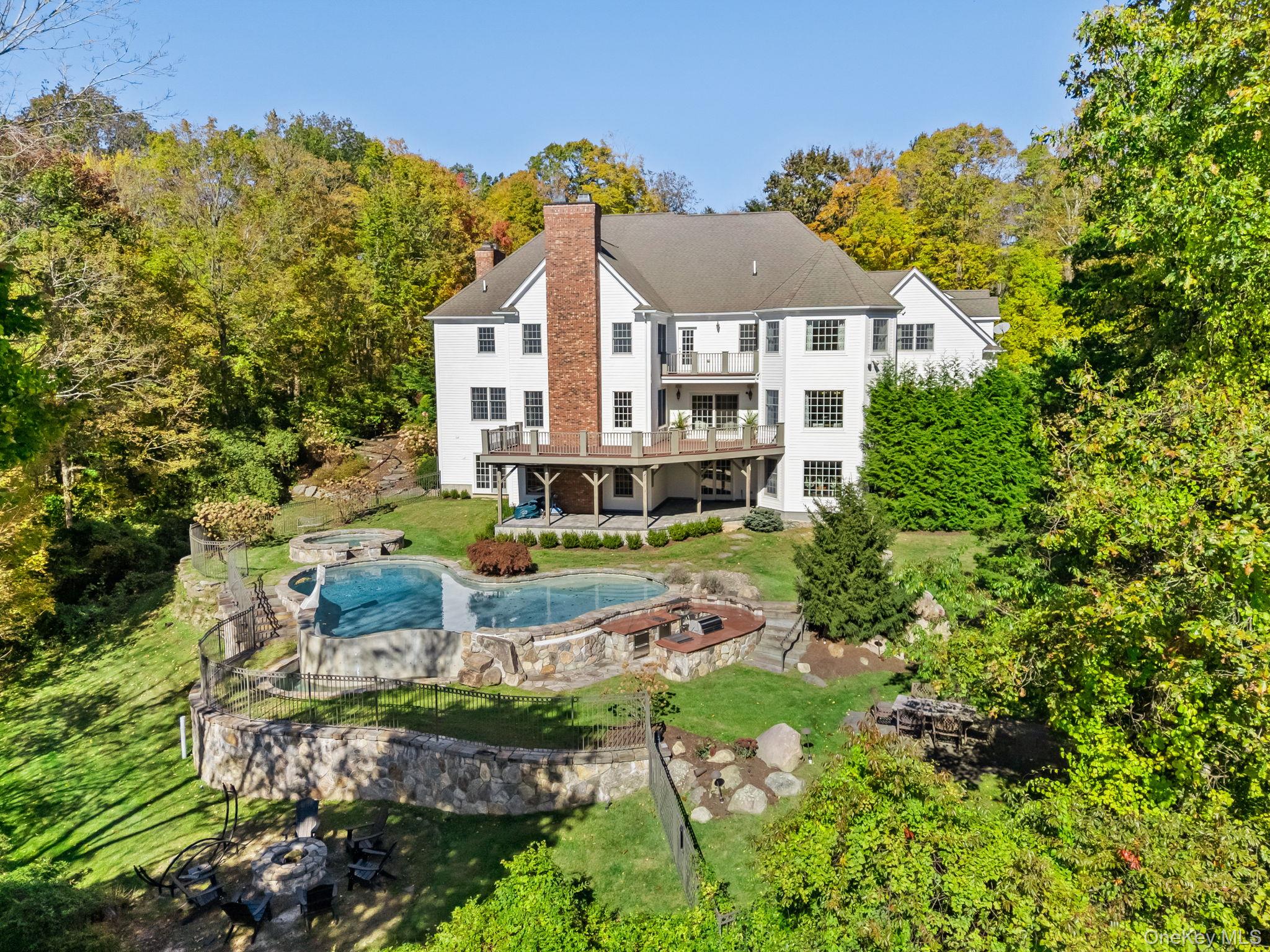 496 Long Ridge Road Bedford, NY 10576 - Photo 44 of 49 an aerial view of a house with a yard