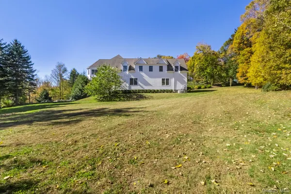 a building with trees in background