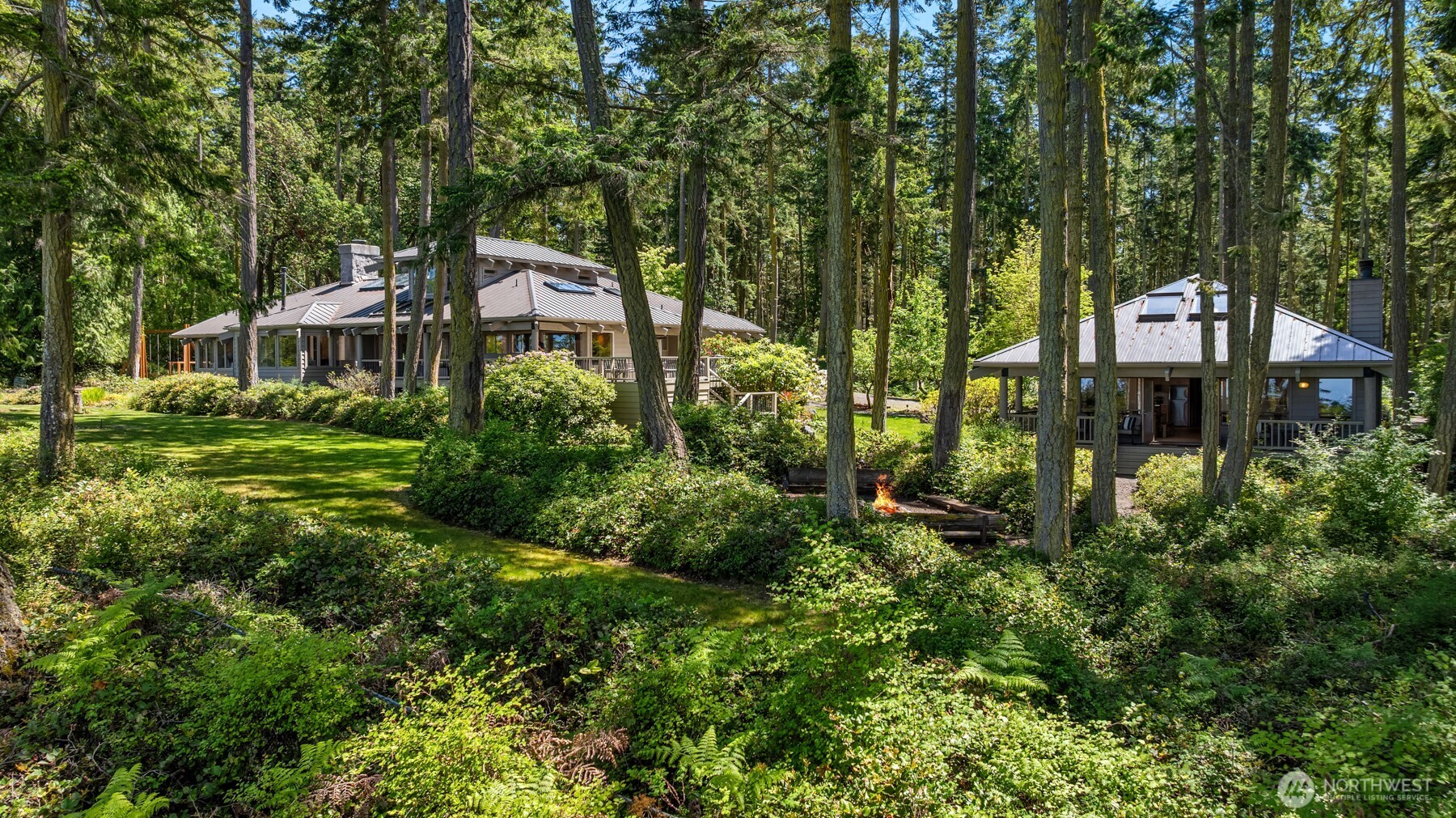 4065 East Sequim Bay Road, Unit 12 Sequim, WA 98382 - Photo 3 of 40 a front view of a house with a yard and tree