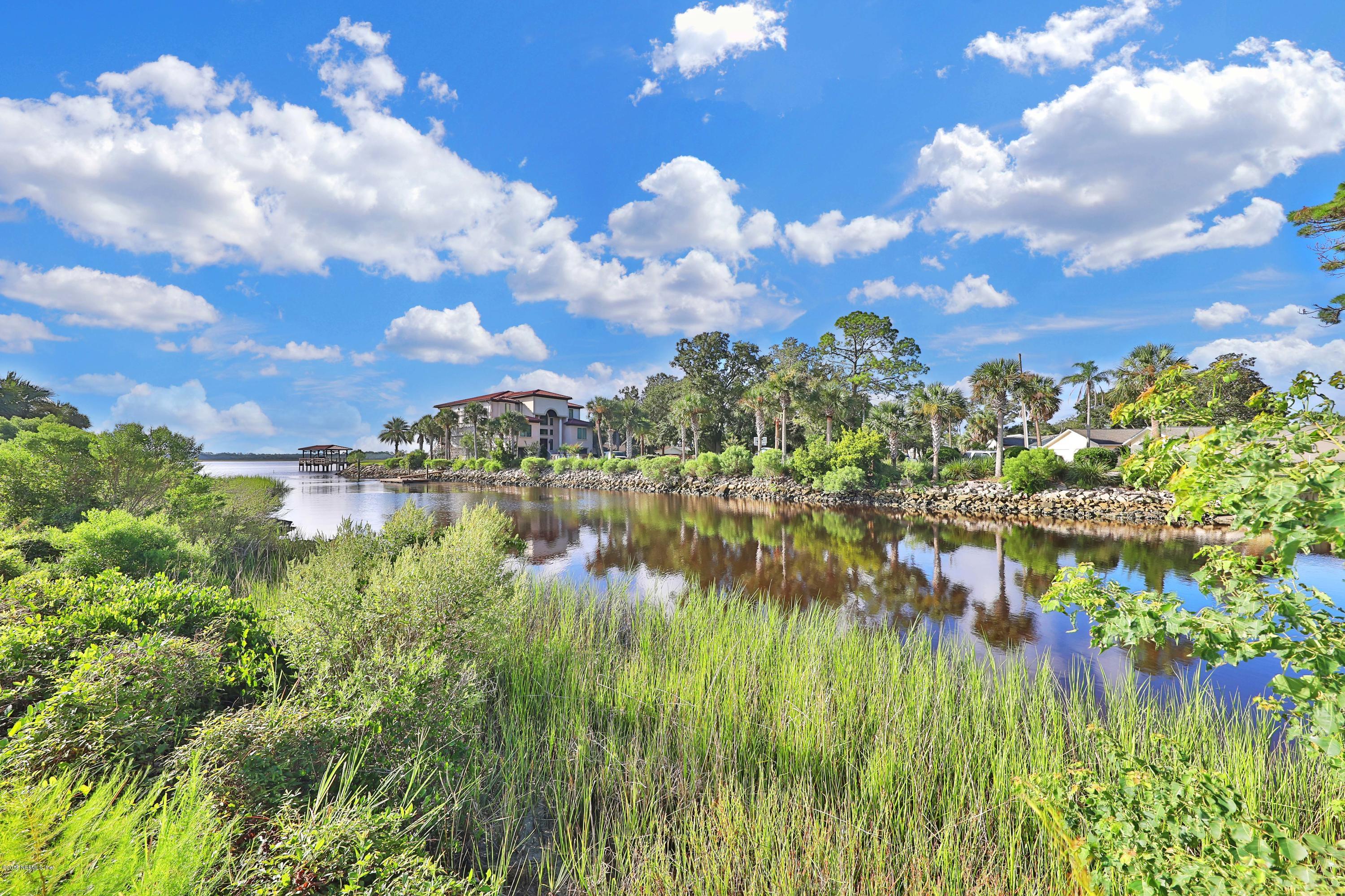L6 Stacey Road Jacksonville, FL 32250 - Photo 1 of 4 a view of a lake in middle of a city