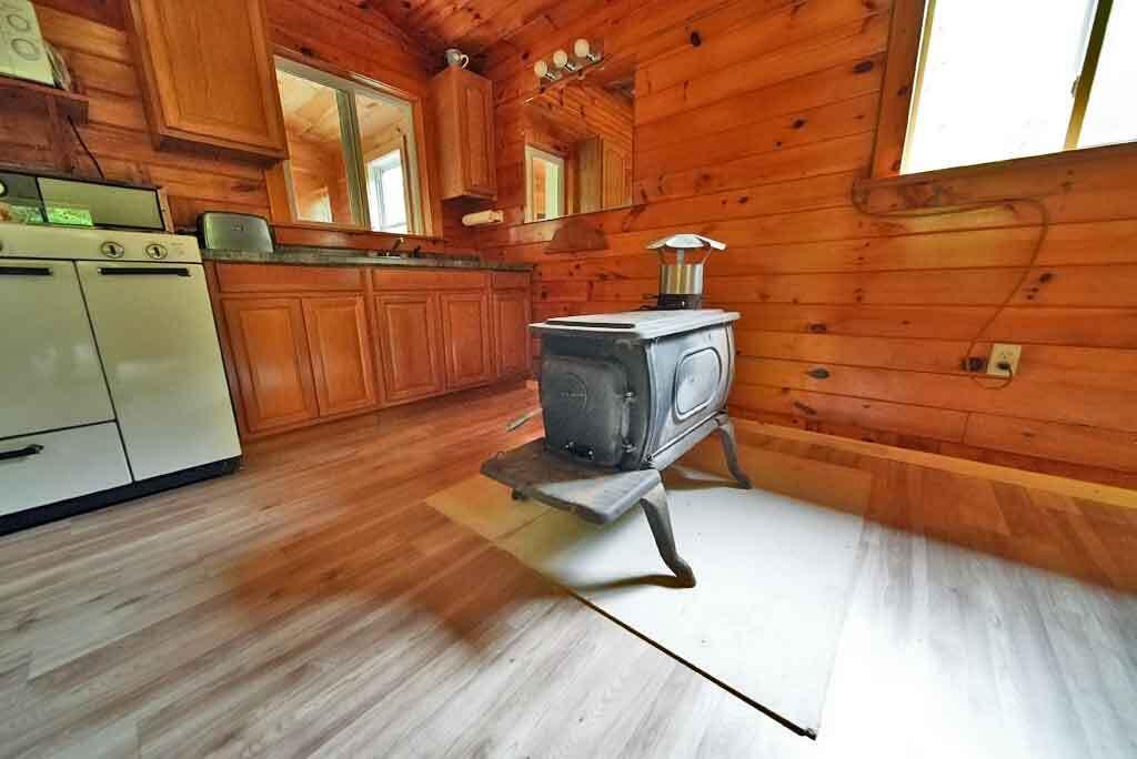 Lot 33 Woodcock Road Linneus, ME 04730 - Photo 10 of 55 woodstove-needs-chimney