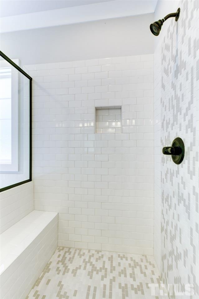 1033 Sky Wave Trail, Unit 8 Raleigh, NC 27603 - Photo 11 of 23 a bathroom with a shower