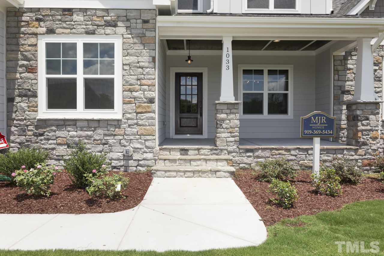 1033 Sky Wave Trail, Unit 8 Raleigh, NC 27603 - Photo 20 of 23 a front view of a house