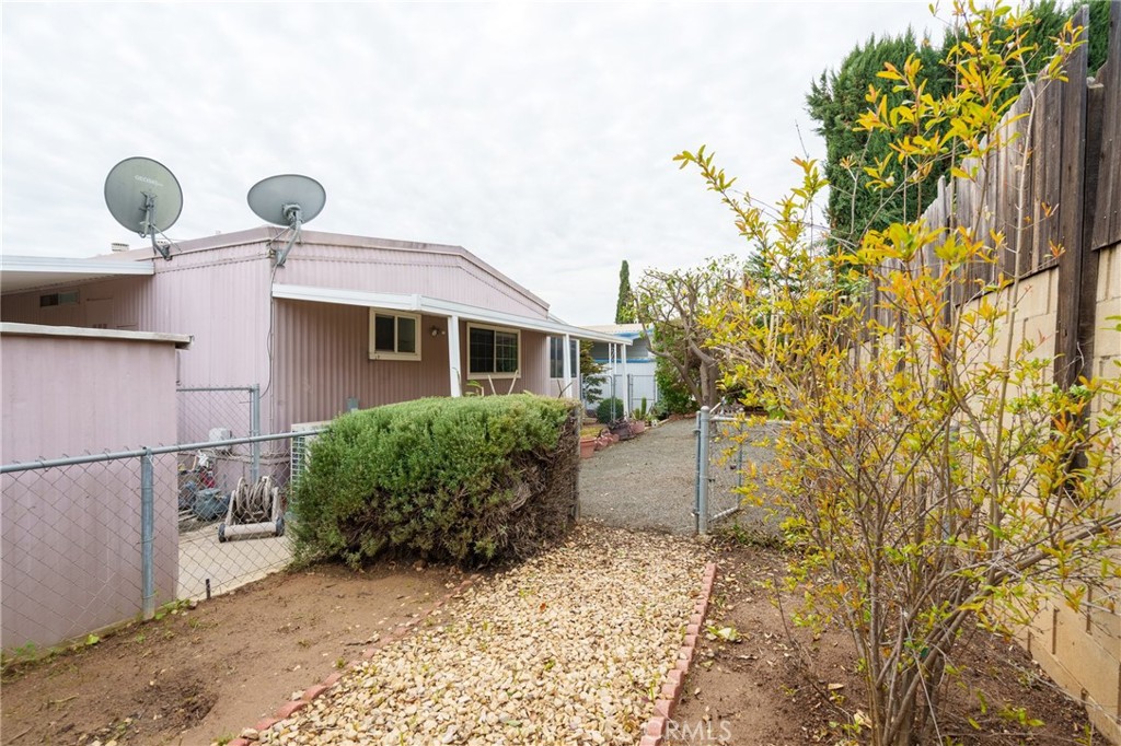 4000 Pierce Street, Unit 72 Riverside, CA 92505 - Photo 19 of 20 a front view of a house with garden