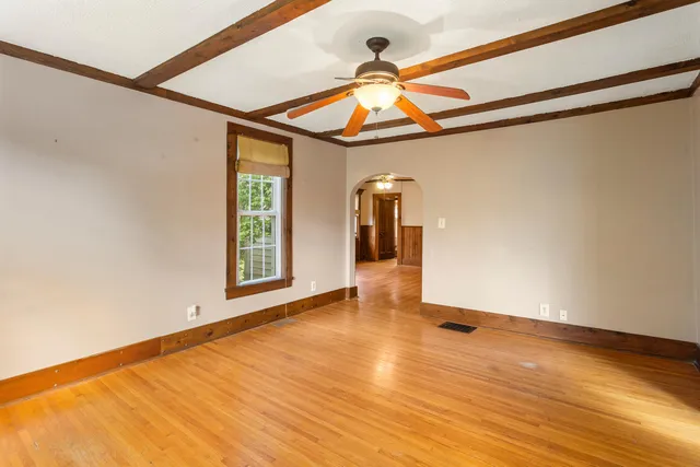 a view of livingroom with hardwood floor and window