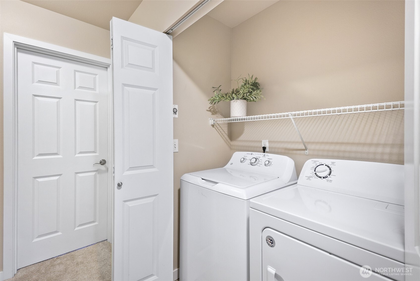1900 Weaver Road, Unit E102 Snohomish, WA 98290 - Photo 16 of 19 a utility room with dryer and washer