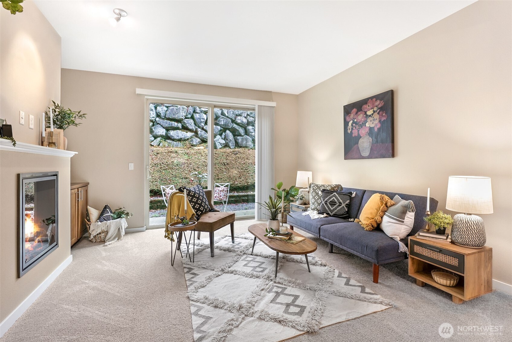 1900 Weaver Road, Unit E102 Snohomish, WA 98290 - Photo 4 of 19 a living room with furniture and a fireplace