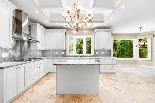 a view of a house with swimming pool and a yard